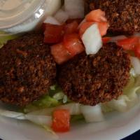 Falafel Appetizer (2) · Two pieces of fried ground chick peas with herbs. Served with tzatziki sauce.