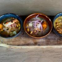 Ceviche Sampler · 2 oz. portions of our tradicional, cremoso and callejero ceviches