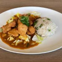 Chicharron De Pescado · Crispy fried fish, spicy Asian sauce, wok fried chaufa blanco