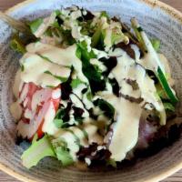 Mixed Green Salad · Lettuce mix, cucumber, tomatoes, house vinaigrette