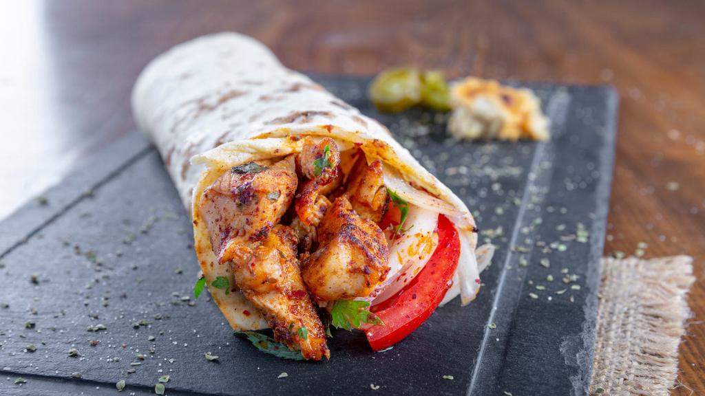 Honey Bbq Chicken
Wrap · Delicious honey BBQ tossed chicken with romaine lettuce, tomatoes, onions and cheese wrapped in a warm tortilla with spicy garlic sauce.
