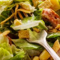 Ranch Chicken Salad · Delicious ranch tossed chicken salad on a bed of romaine lettuce, tomatoes, onions, mixed ch...