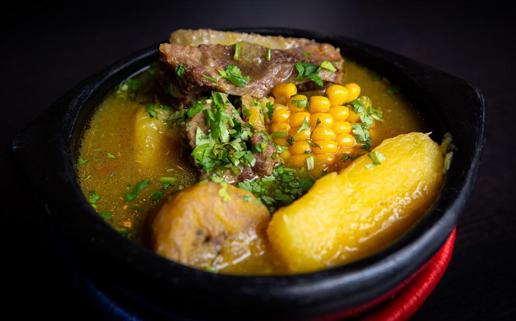 Sancocho De Res · Beef soup (rice, salad, avocado)
