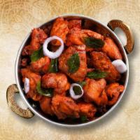 South Side Chicken 65 · Well marinated boneless chicken with indian spices like garlic, bell peppers and onions and ...