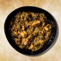 Spinach & Lamb Curry  · Tender chunks of marinated boneless lamb, slow cooked in a thick onion, ginger, garlic and s...