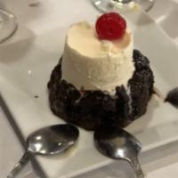 Molten Lava Cake · Rich dark chocolate with a creamy fudge center served with Haagen-Dazs vanilla ice cream.