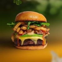 Freedom Fries Burger · Seasoned beyond patty topped with fries, avocado, melted vegan cheese, onion, lettuce, tomat...