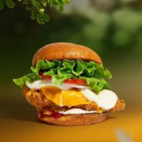 Cheese Biz Chicken Sandwich  · Seasoned fried vegan chicken patty topped with melted vegan cheese, lettuce, tomato, onion, ...