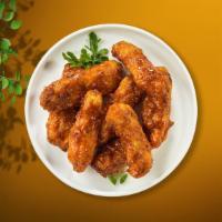 Grilled Shield Tenders · Vegan chicken tenders breaded and fried until golden brown before being tossed in barbecue s...