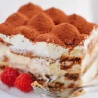 Tiramisu · Layers of sponge cake soaked in coffee with powdered chocolate and mascarpone