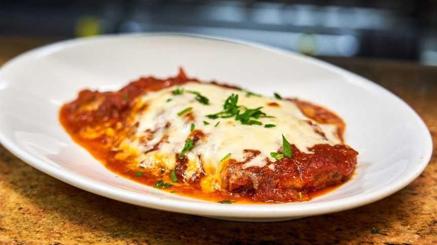 Eggplant Parmigiana · Sliced eggplant filling, layered with cheese and tomato sauce, then baked. 

add more on extra charge