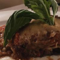 Lasagna · Lasagna sheets, meat sauce, layered with mozzarella cheese and parmesan. Add mozzarella, shr...