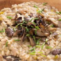 Porcini Mushrooms Risotto · Made with porcini mushrooms, white wine, butter and Parmesan cheese. 
add more on extra charge