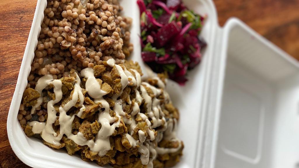 Shawarma  · middle eastern “gyro” made of flavored textured soy chunks with onion and garlic
