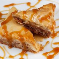 Baklava · Delicious, flaky dessert made with thin sheets of dough soaked in honey and layered with wal...