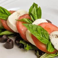 Caprese Salad · Fresh mozzarella, tomato, basil, balsamic vinegar and olive oil.