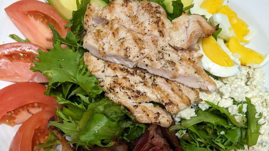 Cobb Salad · Mixed greens, bacon, grilled chicken, egg, tomatoes, avocado and blue cheese crumbles with ranch dressing.