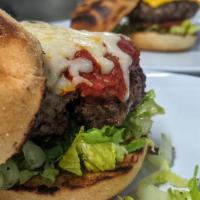 The Italian Burger · Prime burger, lettuce, mozzarella cheese and marinara sauce.