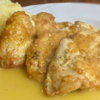 Chicken Française · Chicken breast, flour-dredged and egg dipped with lemon-butter and white wine sauce.