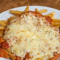 Chicken Parmesan · Breaded chicken breast with tomato sauce and mozzarella cheese.