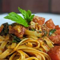 Fettuccine Pomodoro · Fresh tomatoes, marinara sauce, garlic, basil and a touch of parmesan.