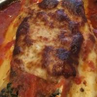 Lasagna · Italian pasta layered with ground beef, ricotta cheese, and marinara sauce.