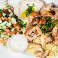 Chicken Shawarma · Marinated chicken stacked and roasted to a perfect flavor
