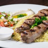 Lamb Kabob · Tender cubes of lamb, marinated and grilled over an open flame
