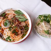 Spicy Noodle Soup · Rice vermicelli, pork, and brisket.