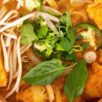 Tofu Curry Pho · vegetarian curry noodle soup w/ fried tofu, onions, cilantro, scallions