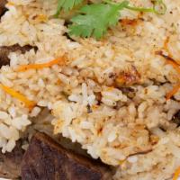 Steak Fried Rice · stir fried w/ carrots, scallions, onions & in our lemongrass sauce