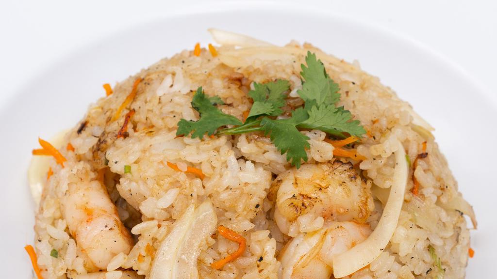 Shrimp Fried Rice · stir fried w/ carrots, scallions, onions & in our lemongrass sauce