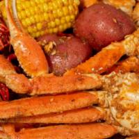 Snow Crab Legs · Every bag includes corn and potato.