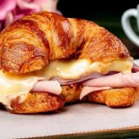 Ham & Cheese Croissant · Hot pressed croissant, ham, and swiss cheese.