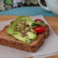 Avocado Toast · Multigrain toasted with butter, avocado spread & sunflower seeds