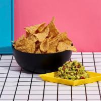 Chips And Guacamole · Chips with a side of guacamole.