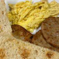 Breakfast Special · Two eggs and choice of bacon, sausage, ham or turkey and toast