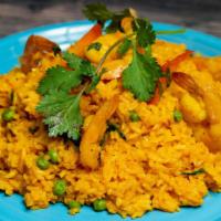 Arroz Con Camarones / Rice With Shrimp · Arroz amarillo con camarones. / Yellow rice with shrimp.