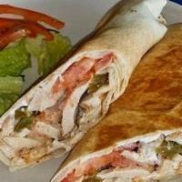 Chicken Shawarma · Chicken shawarma, lettuce, tomato, onion, pickles, garlic spread & tahini.