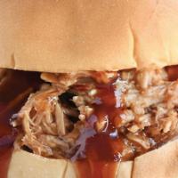 Country Q'S Signature Pulled Pork Sandwich · Tender, delicious, off the bone, pulled pork sandwich.