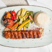Kofte Kebab · Seasoned ground beef and lamb flavored with garlic, onions grilled on flat skewers served ov...