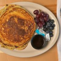 Buttermilk Pancakes · Three fluffy pancakes served with real maple syrup.