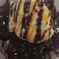 Brownie Lover · Brownie topped with vanilla ice cream topped with  Chocolate & Topped with powered sugar.