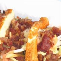 Hot Dog
 · Our delicious nathan’s hot dogs (two sausages) are served with fried cheese, bacon coleslaw,...