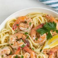Shrimp Scampi · Garlic, parsley, white wine butted sauce over spaghetti