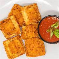 Fried  Cheese Ravioli · With marinara sauce.