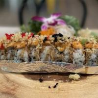 King Roll · Shrimp tempura, cream cheese, Kani salad with baked salmon, tempura flake and eel sauce, and...