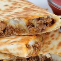 Beef Quesadilla  · Served with sour cream, cheddar cheese sauce and salsa.