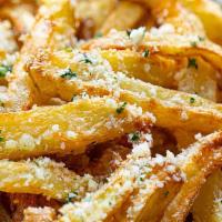 Parmesan Fries · Classic seasoned hand cut fries topped with italian parmesan.