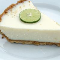 Key Lime Pie · Key lime juice sweetened condensed milk in pie crust served with whipped cream.